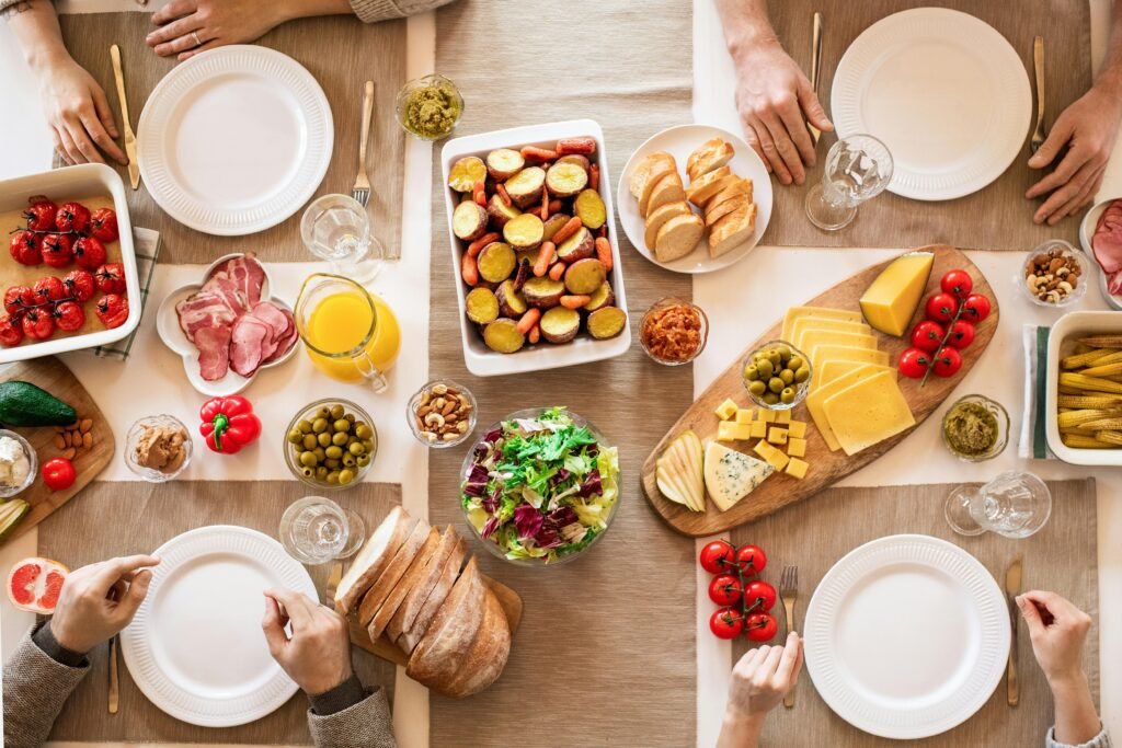 pexels-photo-3757994-3757994 An overhead shot of a diverse, appetizing spread on a dining table ready for a meal.