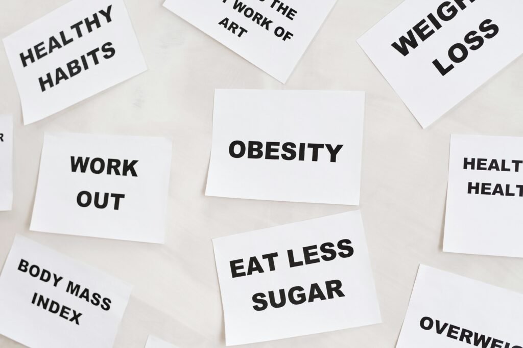 pexels-photo-6669476-6669476 Conceptual image featuring motivational cards on health, fitness, and wellness on a white background.